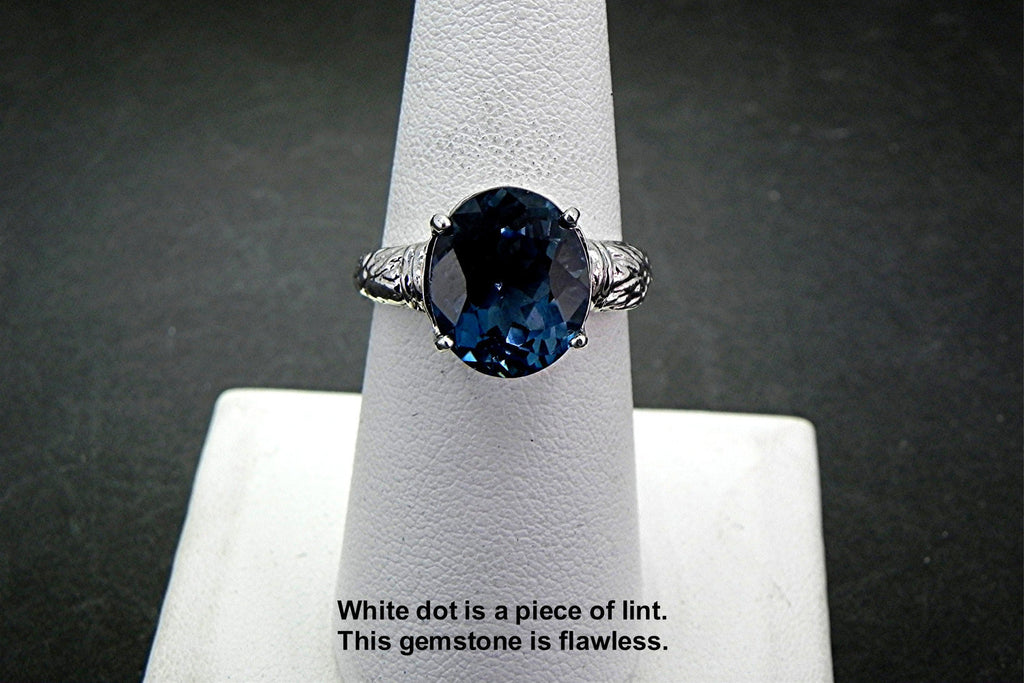 12x10mm 6 carat London Blue Topaz set in an Antique styled Sterling Silver Ring