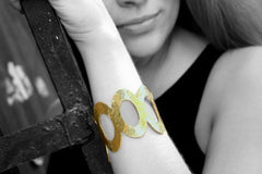 Wide hammered gold bracelet