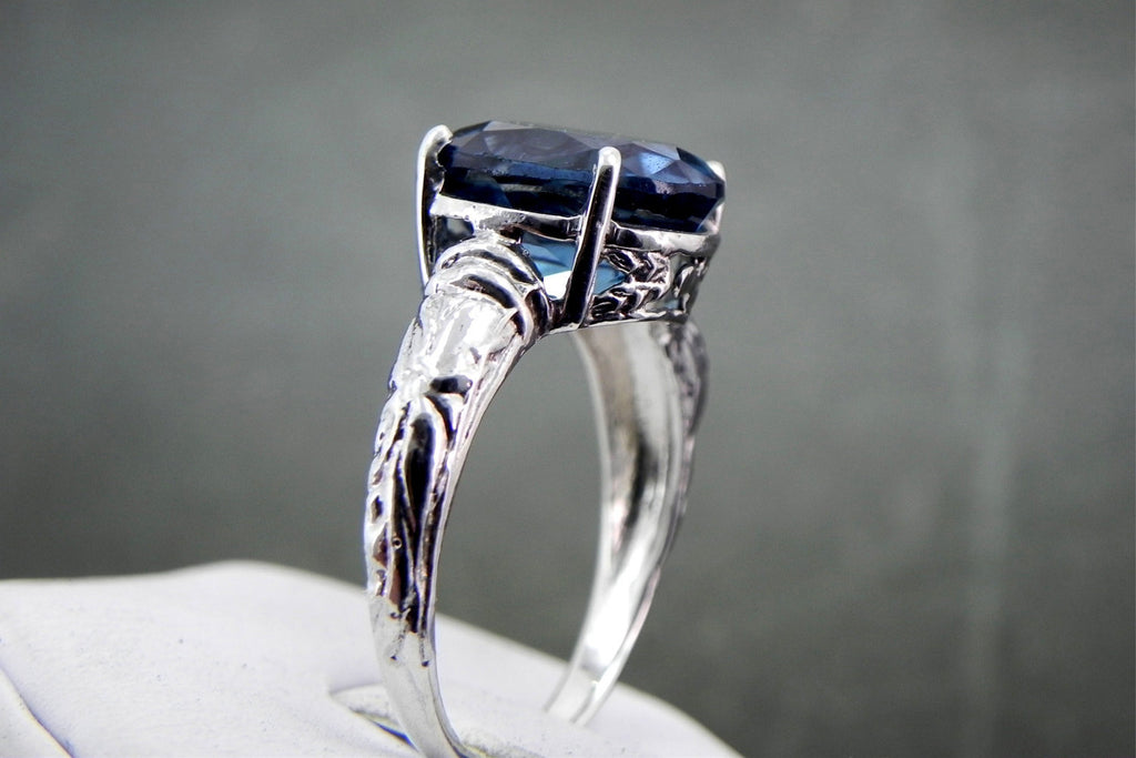 12x10mm 6 carat London Blue Topaz set in an Antique styled Sterling Silver Ring