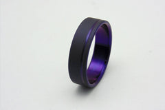 Titanium ring with plum crazy purple pinstripe