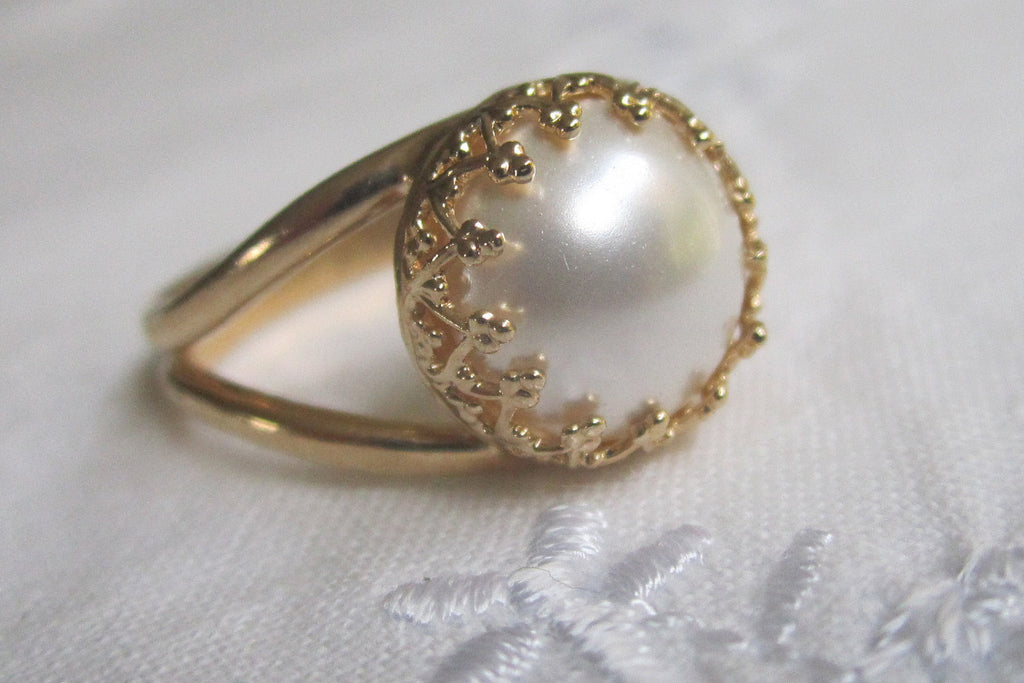 white pearl in gold ring