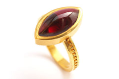 Marquise cut red stone ring