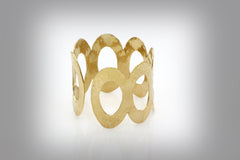 Wide hammered gold bracelet