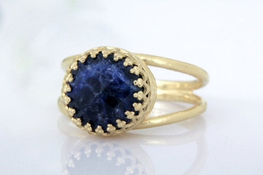 Small navy blue gemstone ring