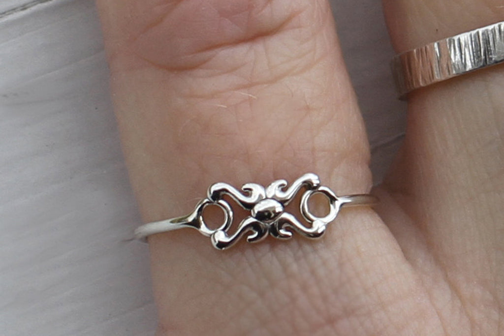 Dainty little sterling silver pinky ring