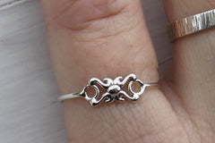 Dainty little sterling silver pinky ring