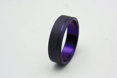 Titanium ring with plum crazy purple pinstripe