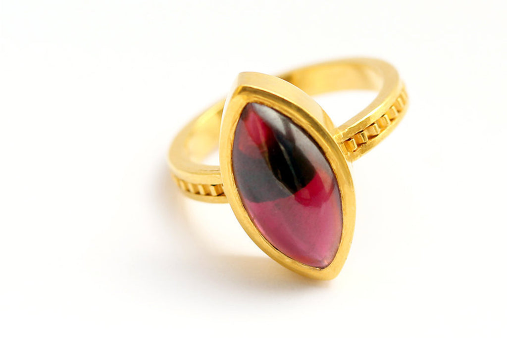 Marquise cut red stone ring
