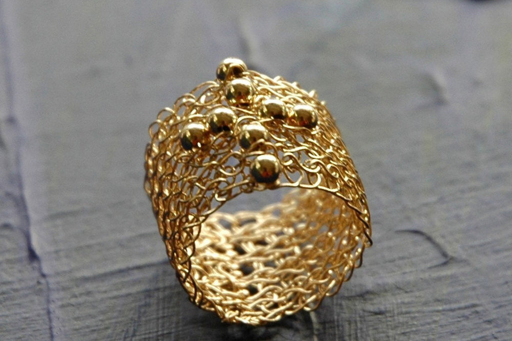 Crochet gold wire band ring with plus symbol