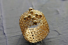 Crochet gold wire band ring with plus symbol