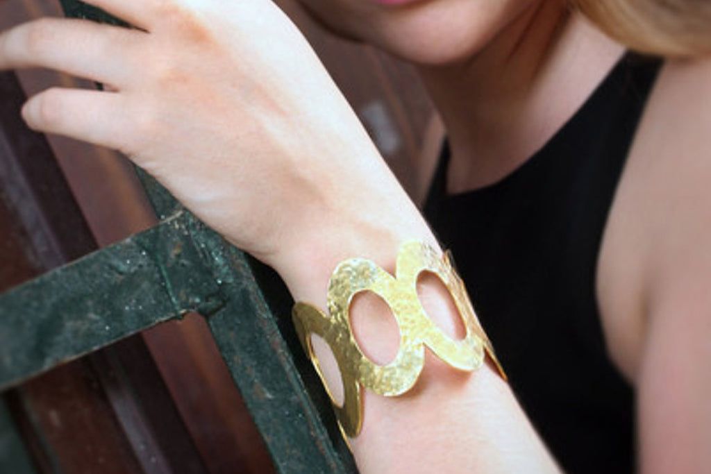 Wide hammered gold bracelet