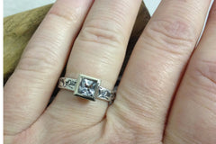 Princess cut white sapphire engagement ring