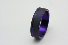 Titanium ring with plum crazy purple pinstripe