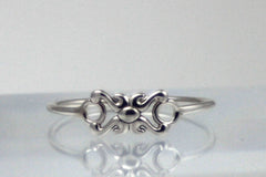 Dainty little sterling silver pinky ring