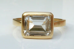 Gold, white topaz engagement ring