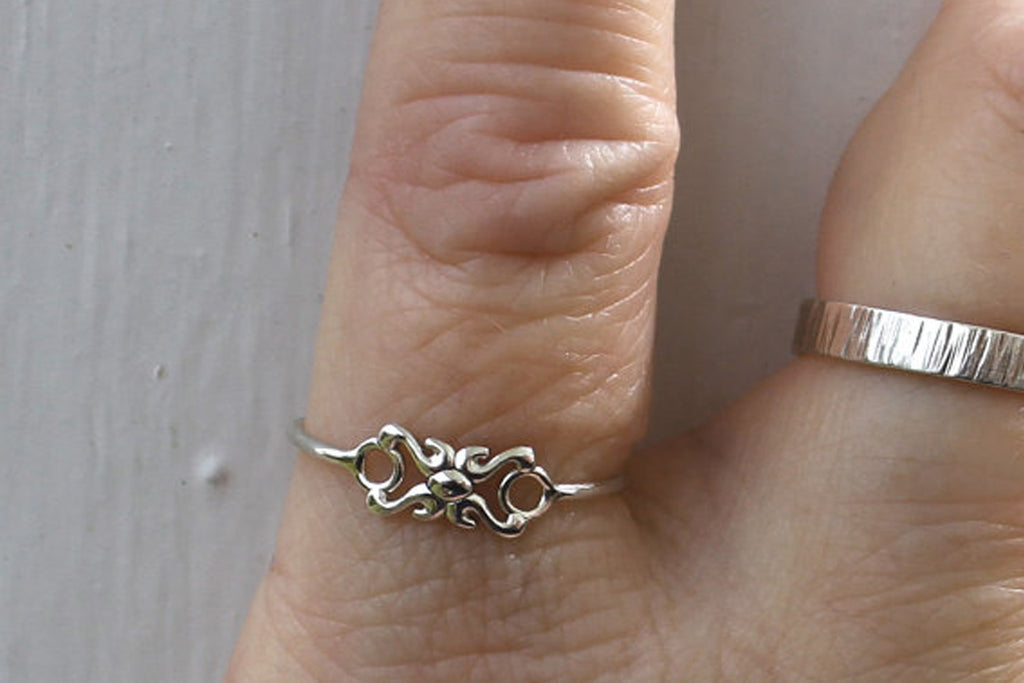 Dainty little sterling silver pinky ring