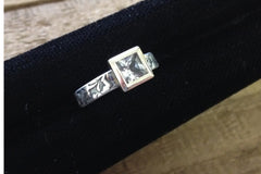 Princess cut white sapphire engagement ring