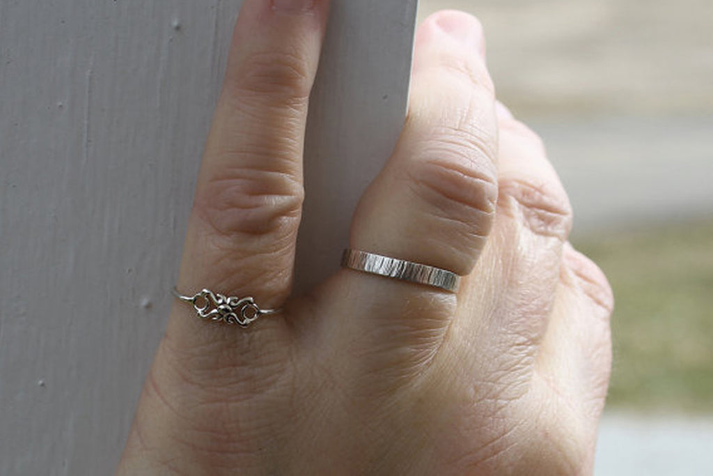 Dainty little sterling silver pinky ring