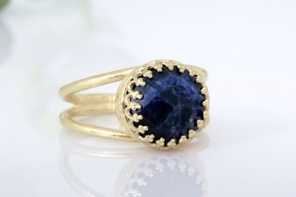 Small navy blue gemstone ring