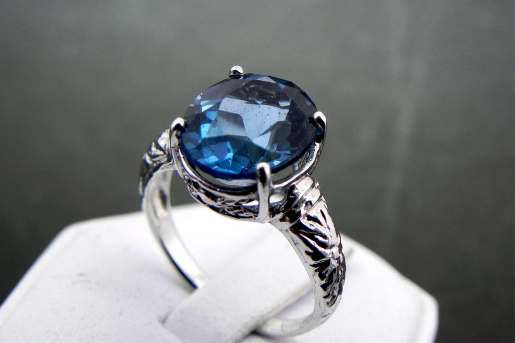 12x10mm 6 carat London Blue Topaz set in an Antique styled Sterling Silver Ring