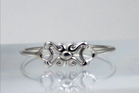 Dainty little sterling silver pinky ring