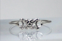 Dainty little sterling silver pinky ring
