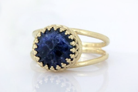 Small navy blue gemstone ring