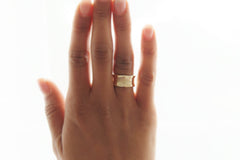 Wide gold wedding ring