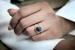 Small navy blue gemstone ring