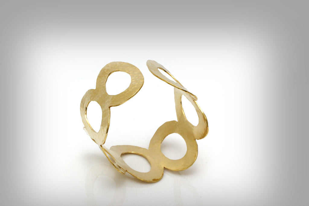 Wide hammered gold bracelet
