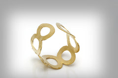 Wide hammered gold bracelet